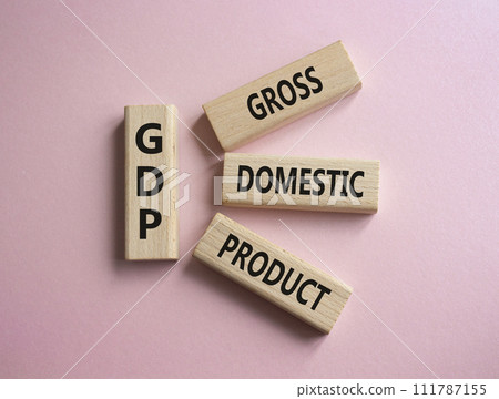 GDP - Gross domestic product symbol. Concept word GDP on wooden blocks. Beautiful pink background. Business and GDP concept. Copy space. GDP - Gross domestic product symbol. Concept word GDP on wooden blocks. Beautiful pink background. Business and GDP concept. Copy space. 111787155