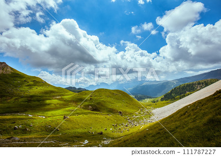 landscape with mountains, hills and clouds landscape with mountains, hills and clouds 111787227