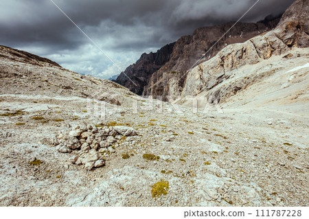 landscape with mountains, clouds and rocks landscape with mountains, clouds and rocks 111787228