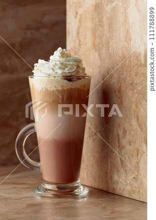 Milk coffee cocktail with whipped cream. 111788899
