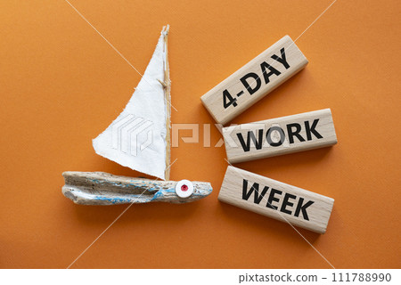 4-day work week symbol. Concept words 4-day work week on wooden blocks. Beautiful orange background with boat. Business and 4-day work week concept. Copy space 4-day work week symbol. Concept words 4-day work week on wooden blocks. Beautiful orange background with boat. Business and 4-day work week concept. Copy space 111788990