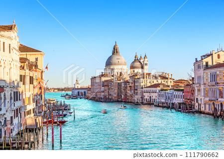 Beautiful view of Grand Canal and Basilica Santa Maria della Salute in Venice, Italy. Beautiful view of Grand Canal and Basilica Santa Maria della Salute in Venice, Italy. 111790662