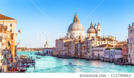 Beautiful view of Grand Canal and Basilica Santa Maria della Salute in Venice, Italy. Beautiful view of Grand Canal and Basilica Santa Maria della Salute in Venice, Italy. 111790663