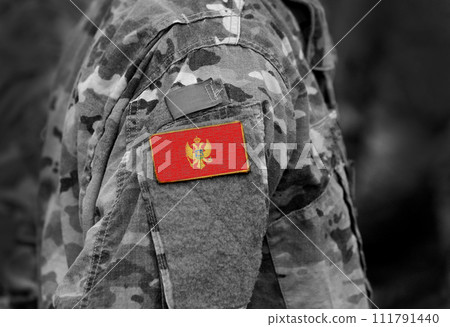 Montenegro flag on soldiers arm (collage). Montenegro flag on soldiers arm (collage). 111791440