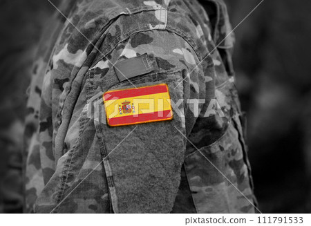 Flag of Spain on soldiers arm (collage). Flag of Spain on soldiers arm (collage). 111791533