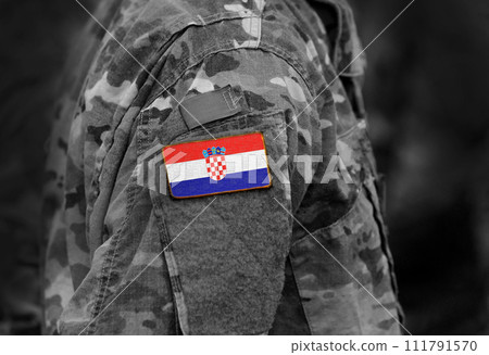 Flag of Croatia on soldiers arm (collage). Flag of Croatia on soldiers arm (collage). 111791570