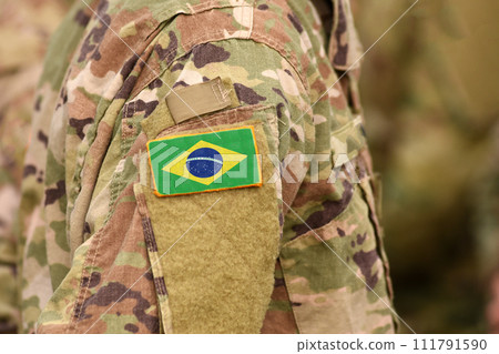 Brazil flag on soldiers arm. Brazil troops (collage) 111791590