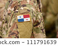 Flag of Panama on soldiers arm (collage). 111791639