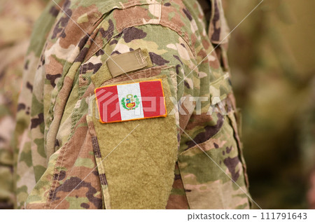 Peru flag on soldiers arm. Peru troops (collage) 111791643