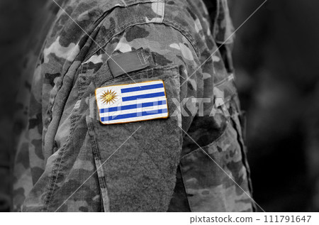 Flag of Uruguay on soldiers arm. Flag of Uruguay on military uniforms (collage). Flag of Uruguay on soldiers arm. Flag of Uruguay on military uniforms (collage). 111791647