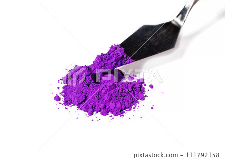 a bunch of dry natural purple pigment on a white background macro a bunch of dry natural purple pigment on a white background macro 111792158