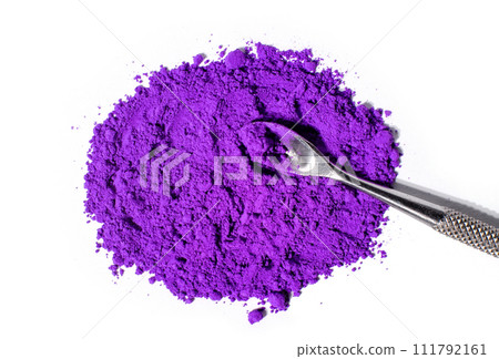 a bunch of dry natural purple pigment on a white background macro a bunch of dry natural purple pigment on a white background macro 111792161