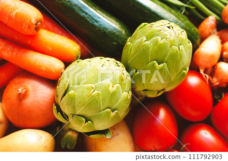 Vegetables on a wooden table, overhead shot 111792903