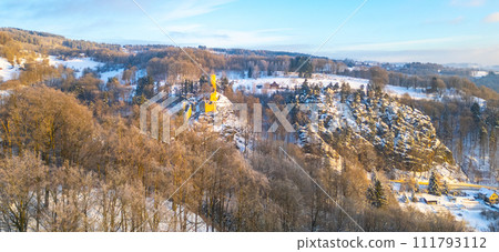 Frydstejn medieval castle ruins at cold morning sunrise time. Bohemian Paradise, Czech: Cesky raj, Czechia. Aerial view from above. Frydstejn medieval castle ruins at cold morning sunrise time. Bohemian Paradise, Czech: Cesky raj, Czechia. Aerial view from above. 111793112
