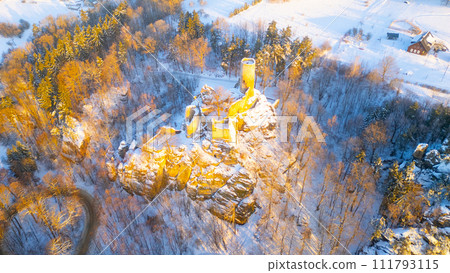 Frydstejn medieval castle ruins at cold morning sunrise time. Bohemian Paradise, Czech: Cesky raj, Czechia. Aerial view from above. Frydstejn medieval castle ruins at cold morning sunrise time. Bohemian Paradise, Czech: Cesky raj, Czechia. Aerial view from above. 111793115