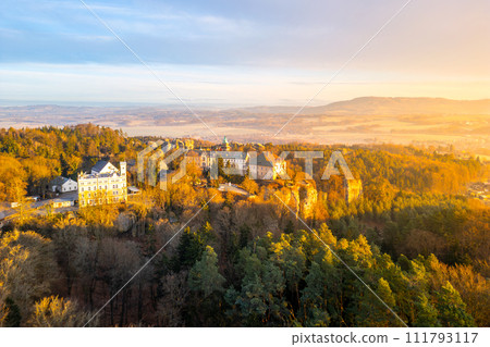 Hruba Skala chateau at cold morning sunrise time. Bohemian Paradise, Czech: Cesky raj, Czechia. Aerial view from above. 111793117
