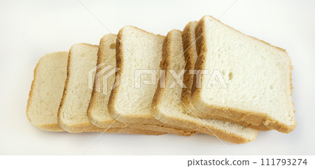 Sliced toasted bread. The concept of baking bread. Sliced toasted bread. The concept of baking bread. 111793274