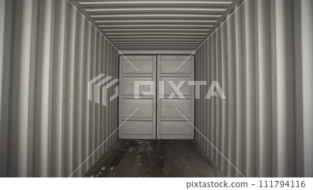 Large metallic white door and white metal corrugated passage with wooden floor. Stock footage. Close-up view 111794116