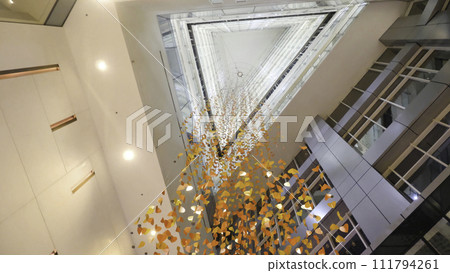 Large window on the ceiling, great transparent glass on the roof in luxury hotel, modern architecture, luxurious contemporary construction creative design concept Large window on the ceiling, great transparent glass on the roof in luxury hotel, modern architecture, luxurious contemporary construction creative design concept 111794261