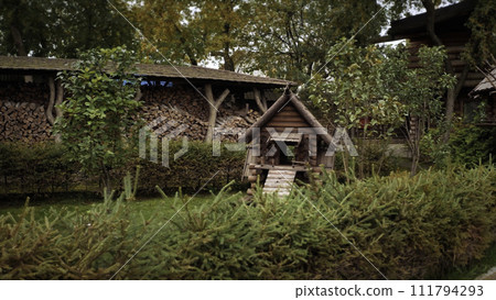 Fabulous decorative house of Baba Yaga in a park in a forested area in full size. Video. Concept of russian folklore, fairytales. Fabulous decorative house of Baba Yaga in a park in a forested area in full size. Video. Concept of russian folklore, fairytales. 111794293