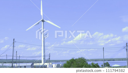 Wind Turbine for alternative energy on background sky. 111794382