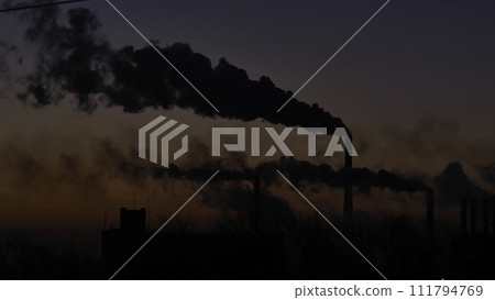 Smoking factory chimneys. Environmental problem of pollution of environment and air in large cities. View of large plant with Smoking pipes. Timelapse 111794769