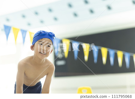 Boys playing in the pool 111795068