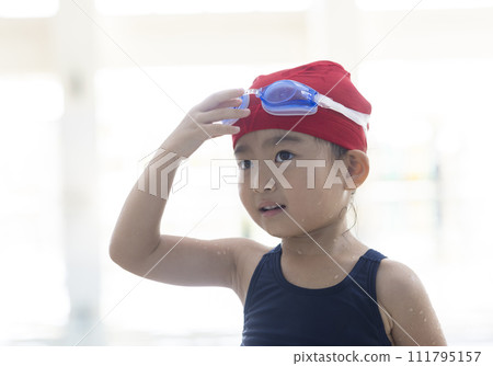 girl enjoying swimming 111795157