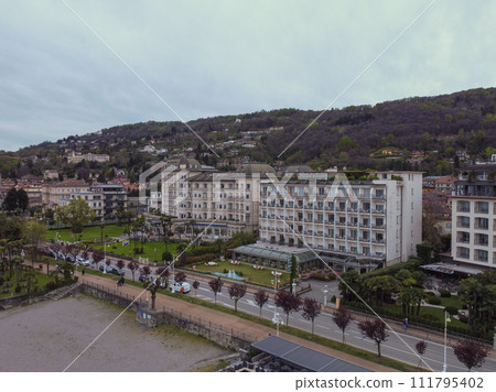 Italy, one of the most beautiful villages of the Lake Como with houses and trees 111795402