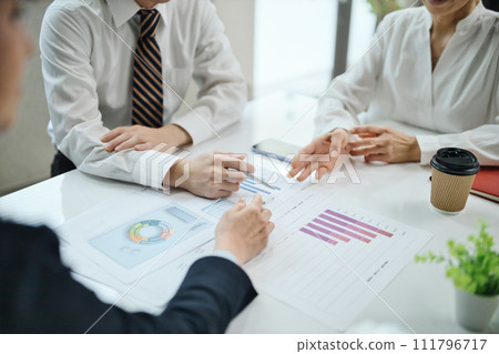 Hands of a business woman having a meeting in the office 111796717
