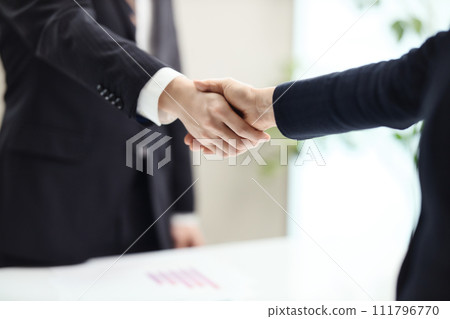 business people shaking hands 111796770