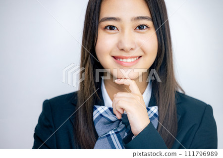 Upper body of a smiling high school girl 111796989
