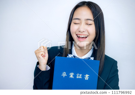 School girls with diploma 111796992