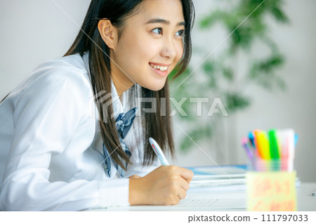High school girl listening to class online 111797033