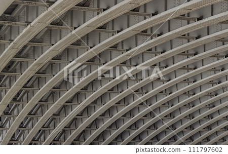 View of Structure and beams under the Curved steel Bridge. View of Structure and beams under the Curved steel Bridge. 111797602