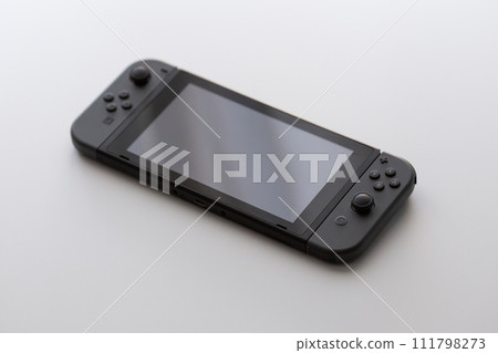 Home-use stationary game console that you can take with you 111798273