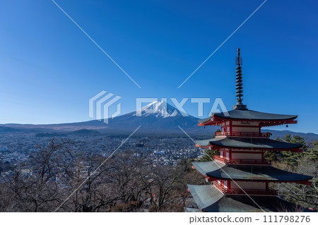 A collaborative scene of Mt. Fuji and the five-storied pagoda seen from the observation deck against the blue sky A collaborative scene of Mt. Fuji and the five-storied pagoda seen from the observation deck against the blue sky 111798276