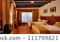 hotel room with bed and chairs 111799821