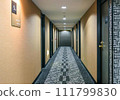 hotel room with bed and chairs 111799830