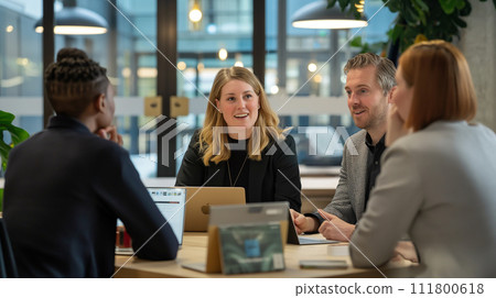 Business meeting taking place in an office environment | Generative AI 111800618