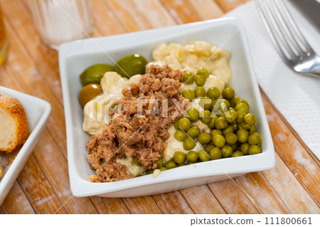 Spanish salad called Ensalada rusa Spanish salad called Ensalada rusa 111800661