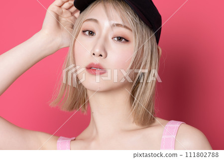 Pop portrait of a young woman shot against a pink background 111802788