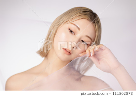 Skin care image of a young high-toned woman Skin care image of a young high-toned woman 111802878