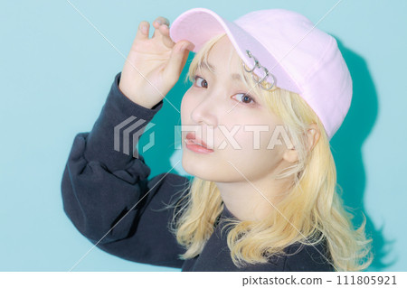 A young woman wearing Korean makeup and a hat A young woman wearing Korean makeup and a hat 111805921