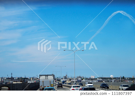 Cars in long exposure blurred in motion travelling along Drive among mountian. Cars in long exposure blurred in motion travelling along Drive among mountian. 111807397