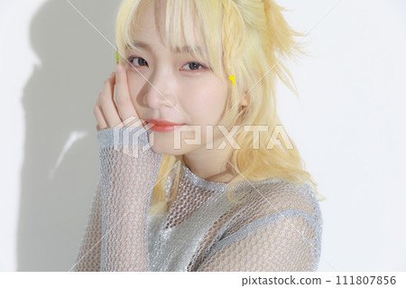 Blonde young woman wearing street fashion Blonde young woman wearing street fashion 111807856