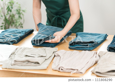 Women working at jeans shops, denim shops, clothing stores, apparel shops Women working at jeans shops, denim shops, clothing stores, apparel shops 111808290