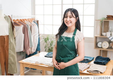 Shop clerks and staff at apparel shops, clothing stores, and jeans shops Shop clerks and staff at apparel shops, clothing stores, and jeans shops 111808304