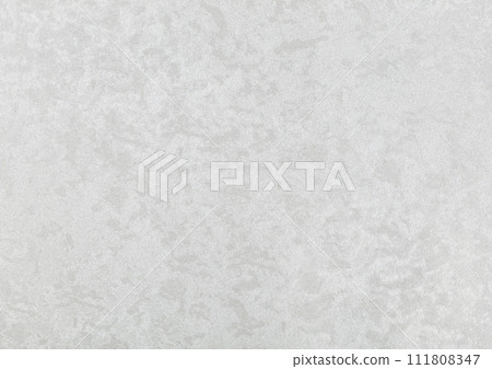 The texture of white paper wallpaper is white with textured chaotic gray small spots. The texture of white paper wallpaper is white with textured chaotic gray small spots. 111808347