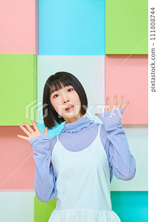 A young woman with a surprised expression 111808744